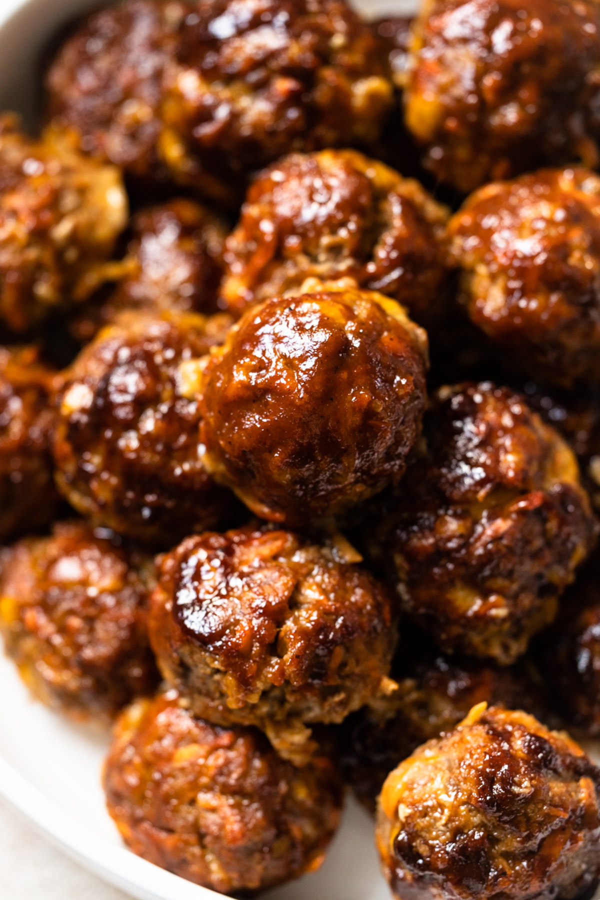 A plate of BBQ Cheddar meatballs.