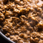 Beef taco filling in a cast iron skillet.