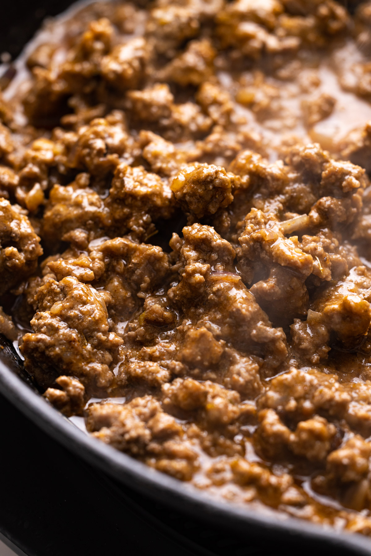 Beef taco filling in a cast iron skillet.