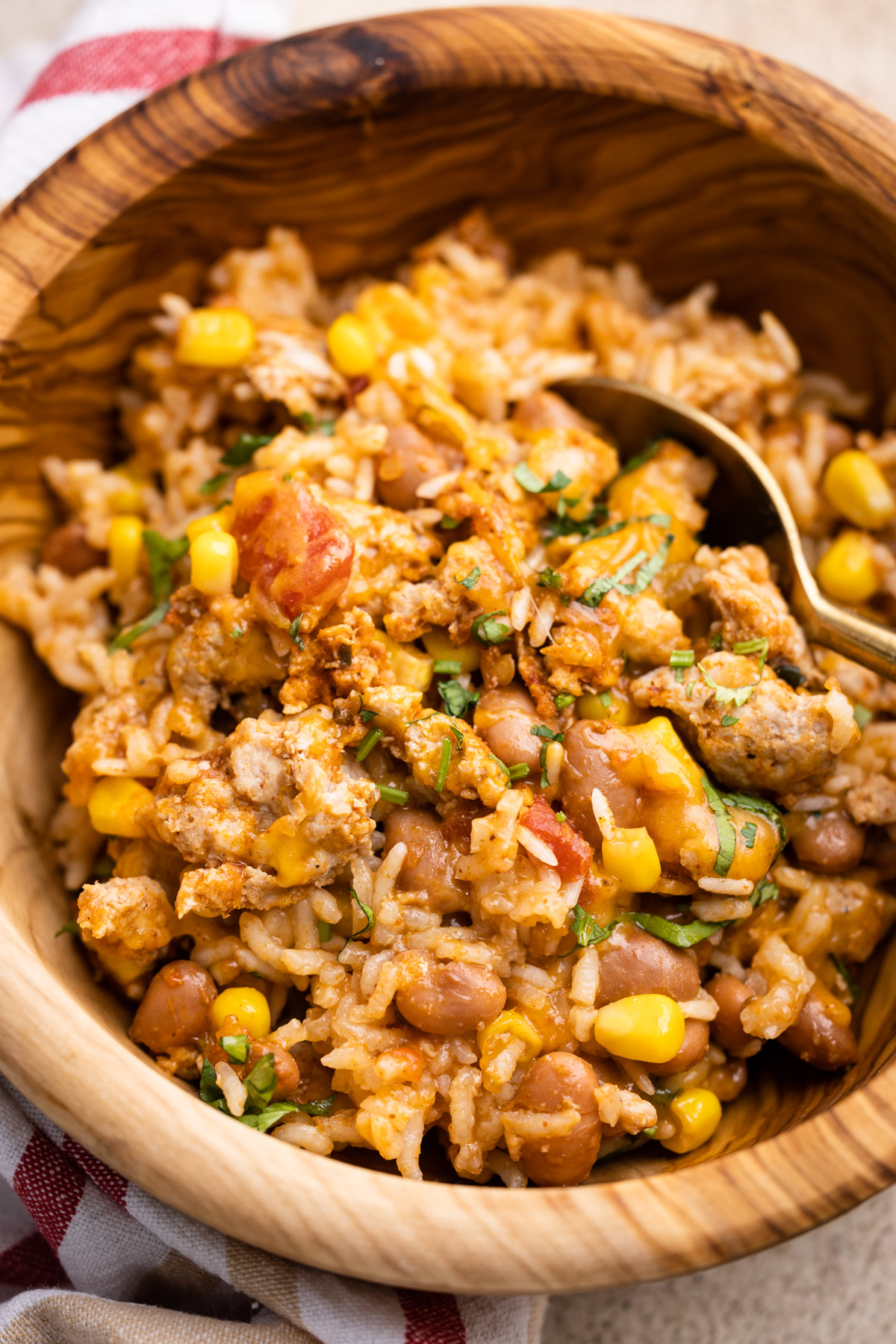 A bowl of ground turkey and rice with taco seasoning.