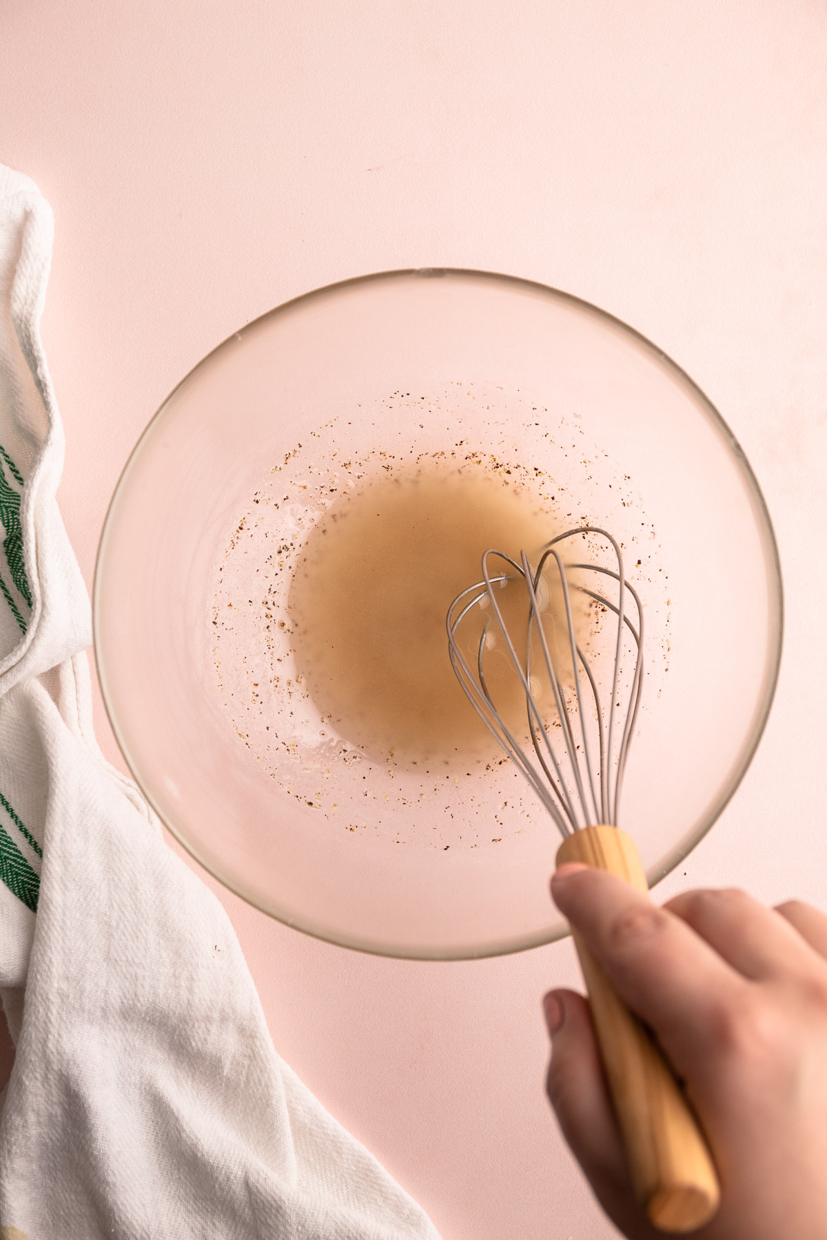 Making a vinaigrette.