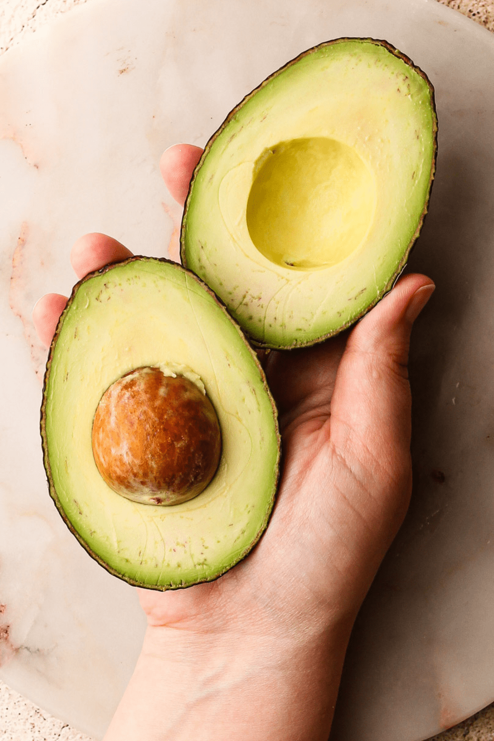 A perfect avocado cut open.