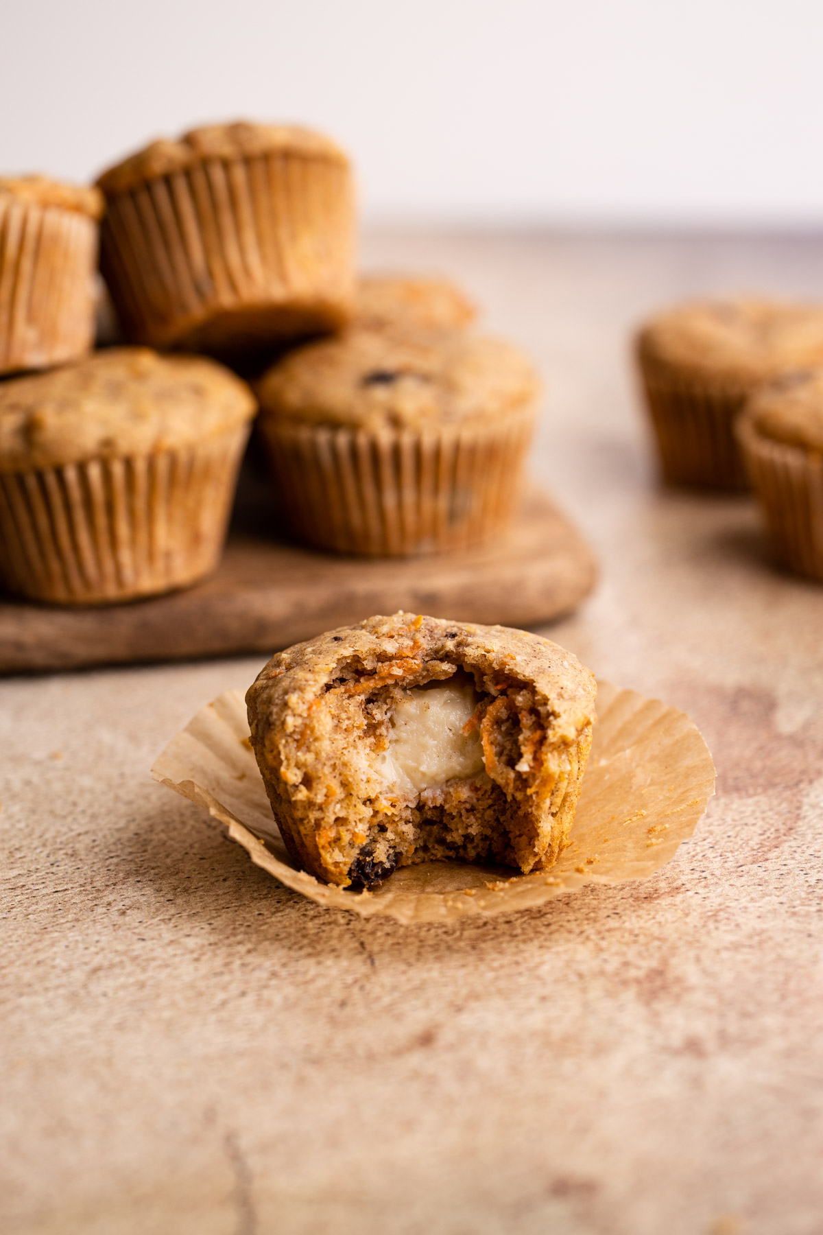 Carrot cake muffins stuffed with cream cheese.