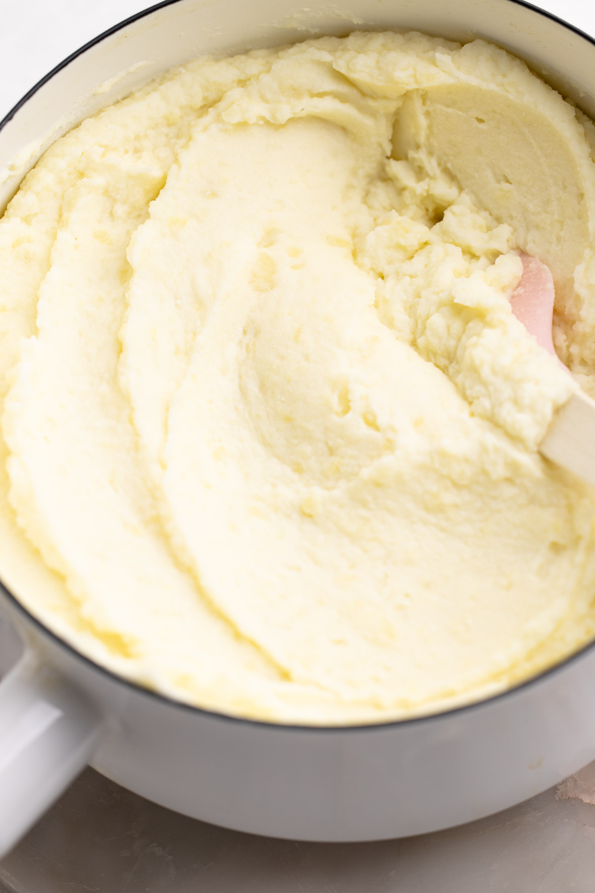 Creamy mashed potatoes in a pot.