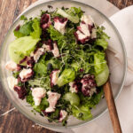 Goat cheese salad with cranberries and cucumbers.