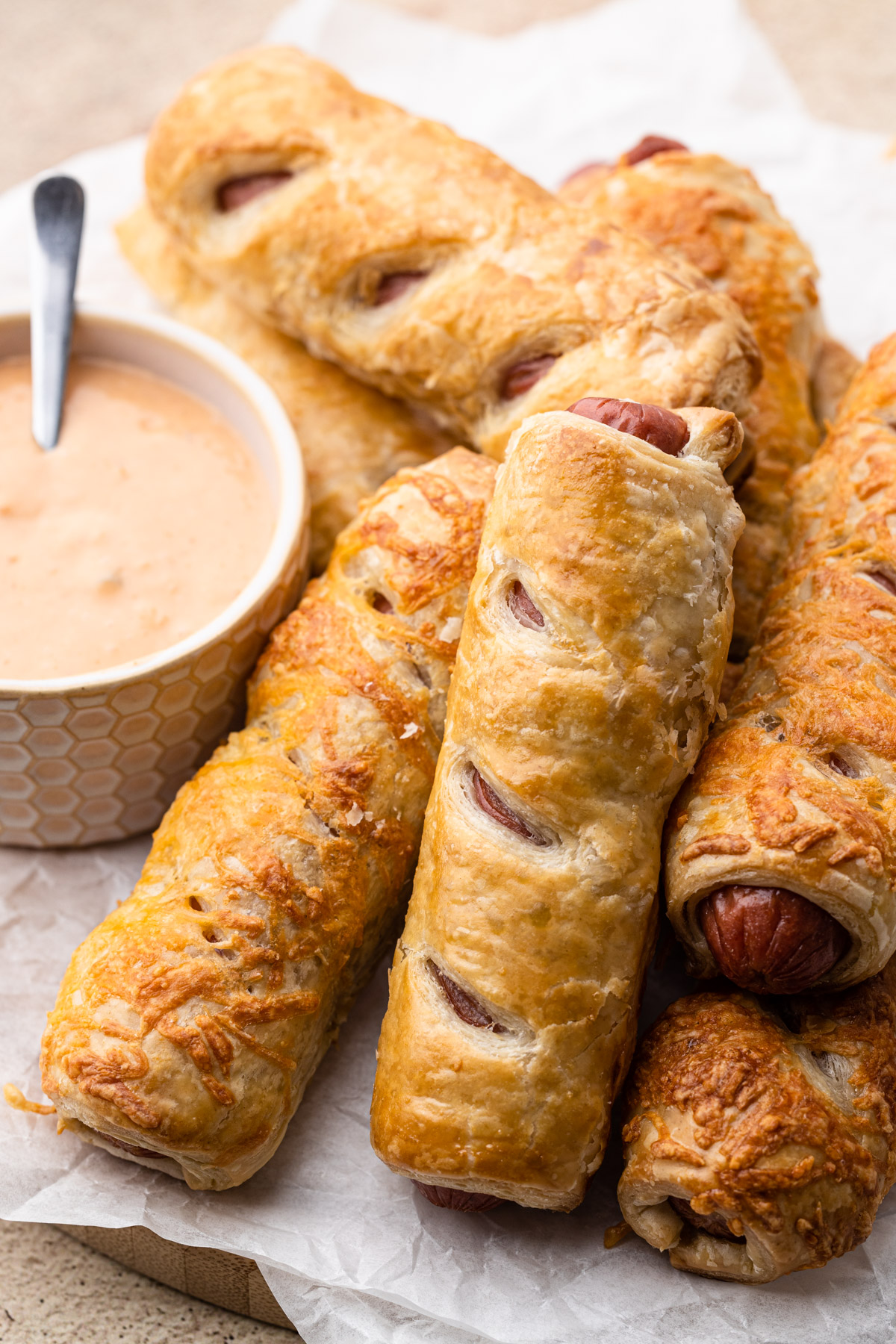 A plate of puff pastry hot dogs.