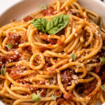 A bowl of pasta made with tomato sauce cooked in the slow cooker.