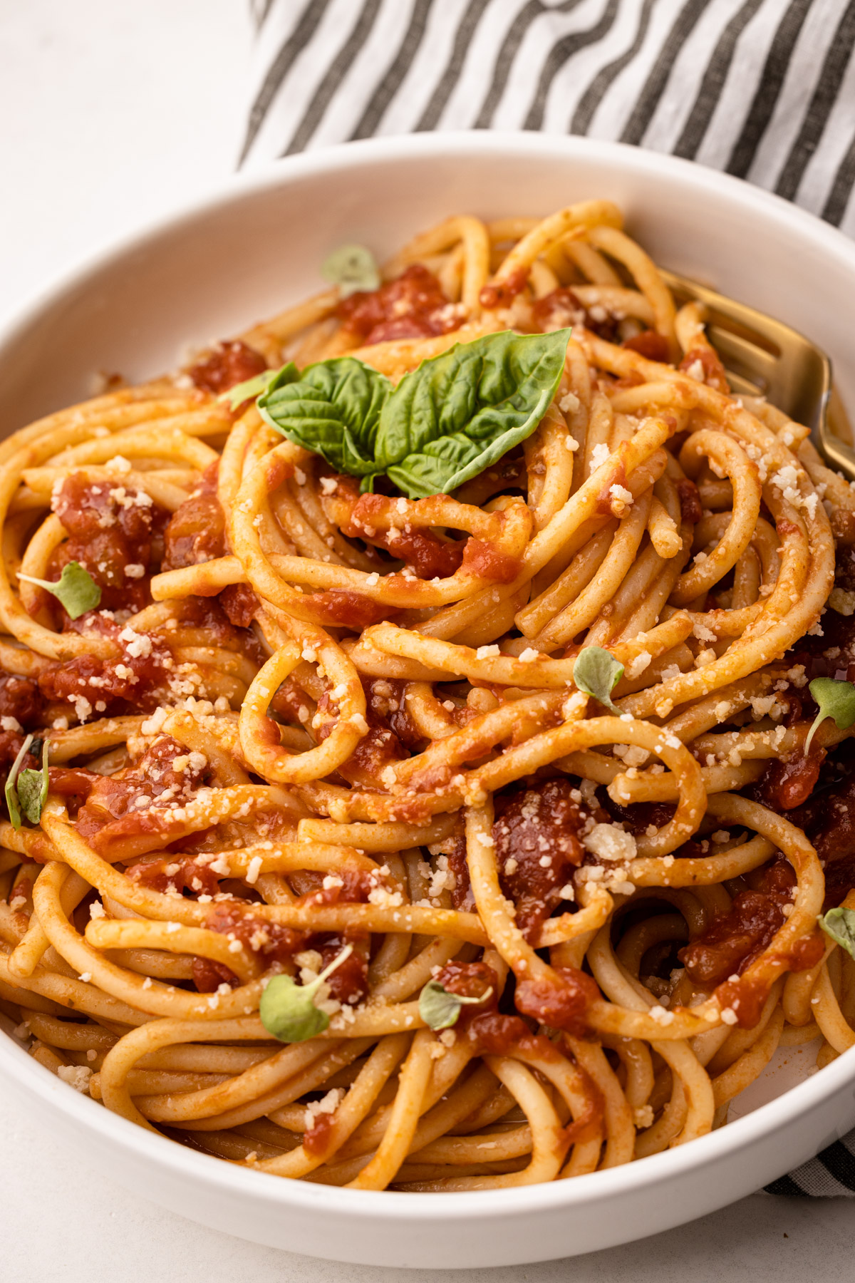A bowl of pasta made with tomato sauce cooked in the slow cooker.