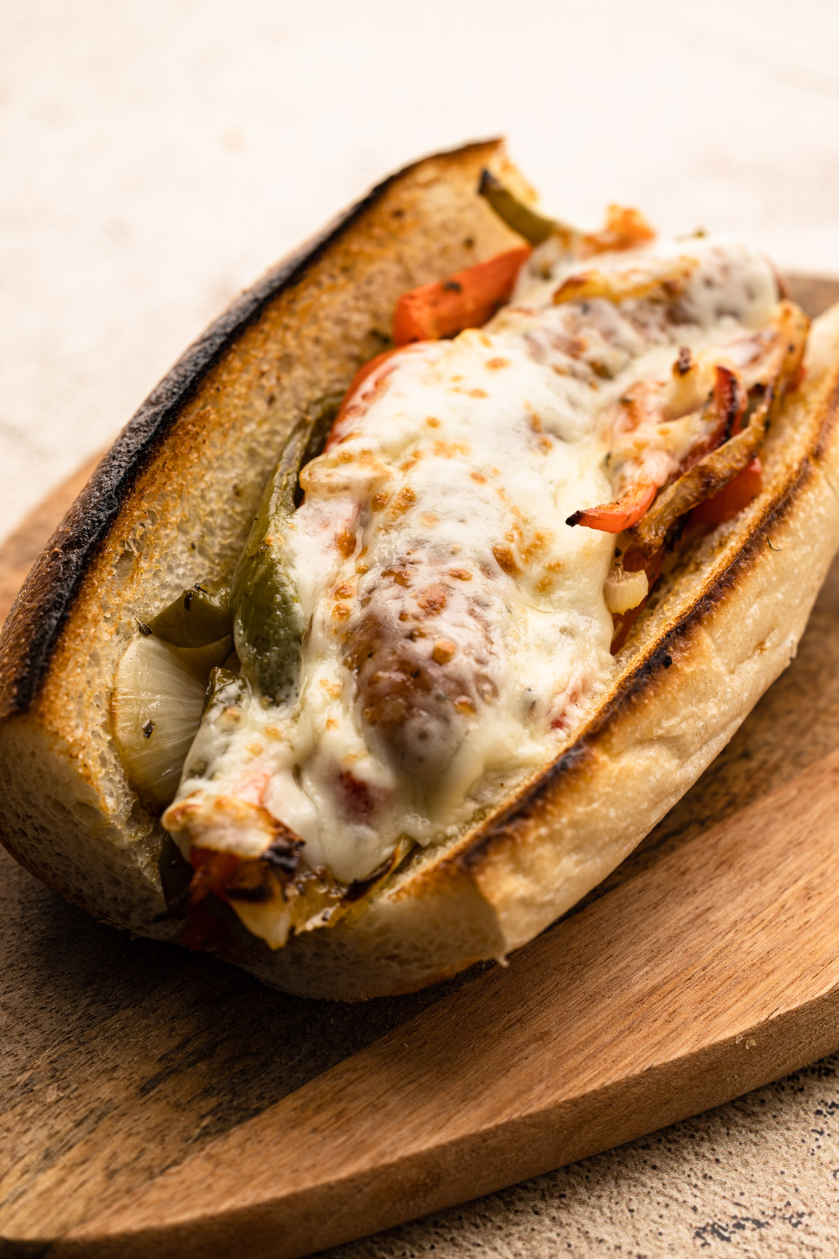 A sausage, pepper and onion sub with provolone cheese.