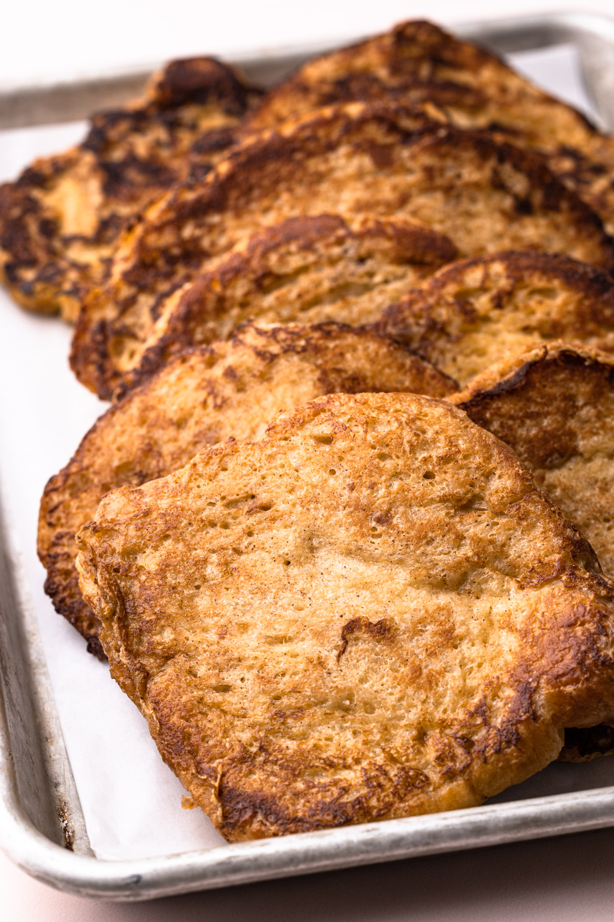 Croissant french toast on a tray.