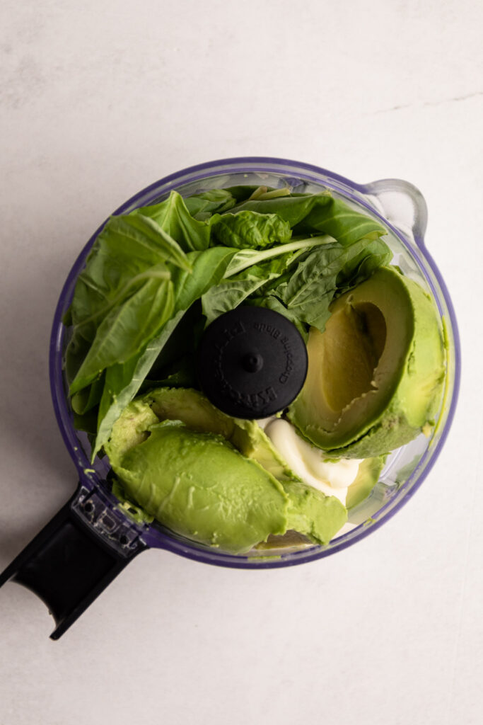 Making an avocado spread for a blt avocado sandwich.