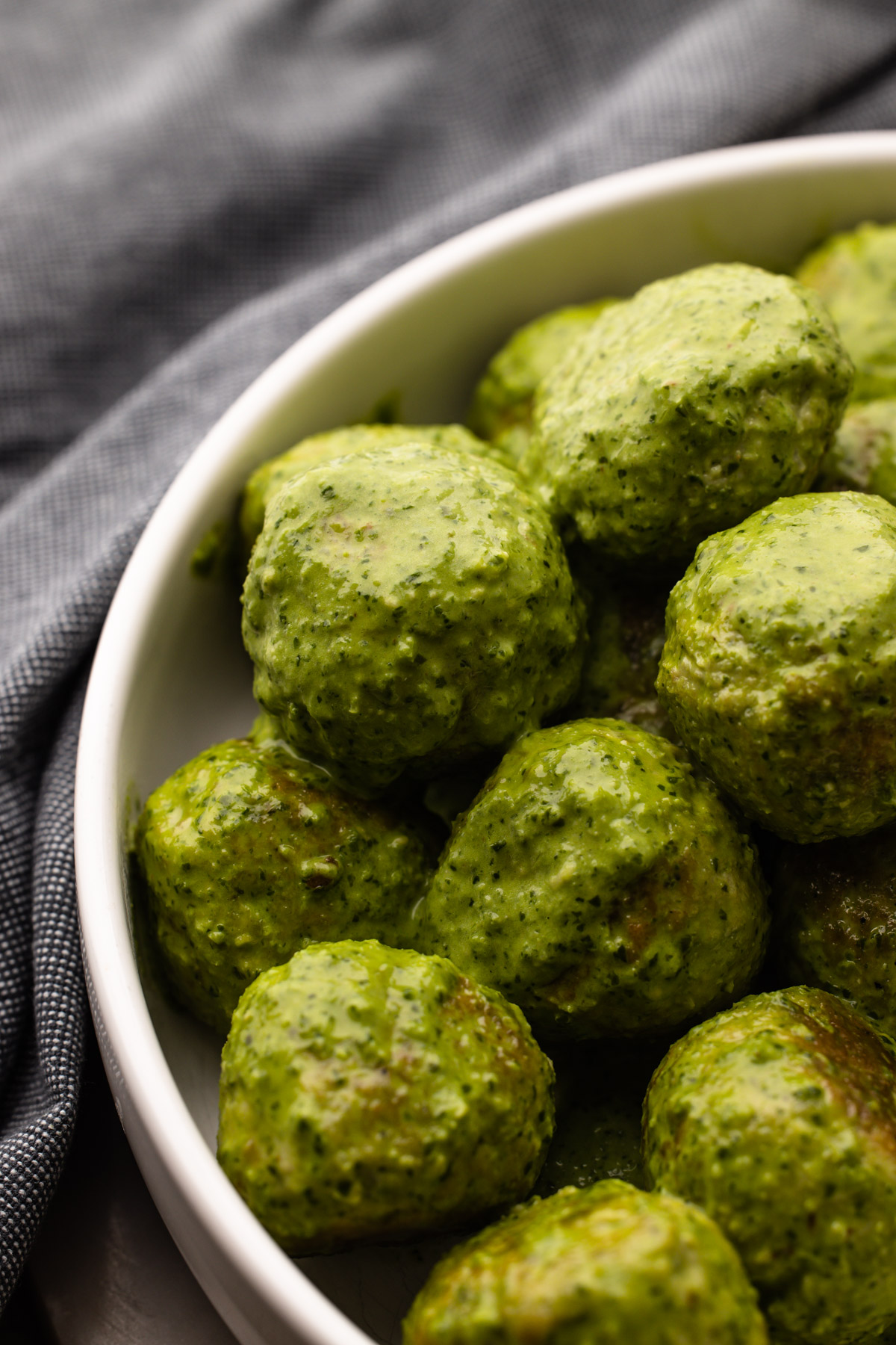 Pesto chicken meatballs in a quick cream sauce.