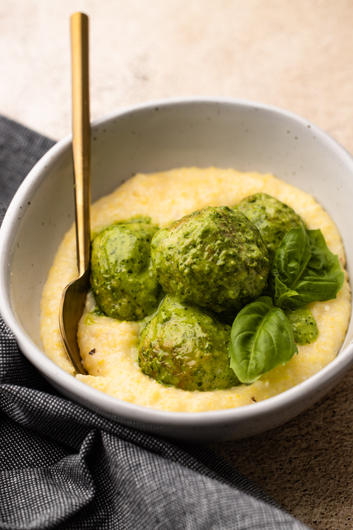 Pesto chicken meatballs with polenta.