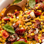 Corn succotash with tomatoes and bacon.