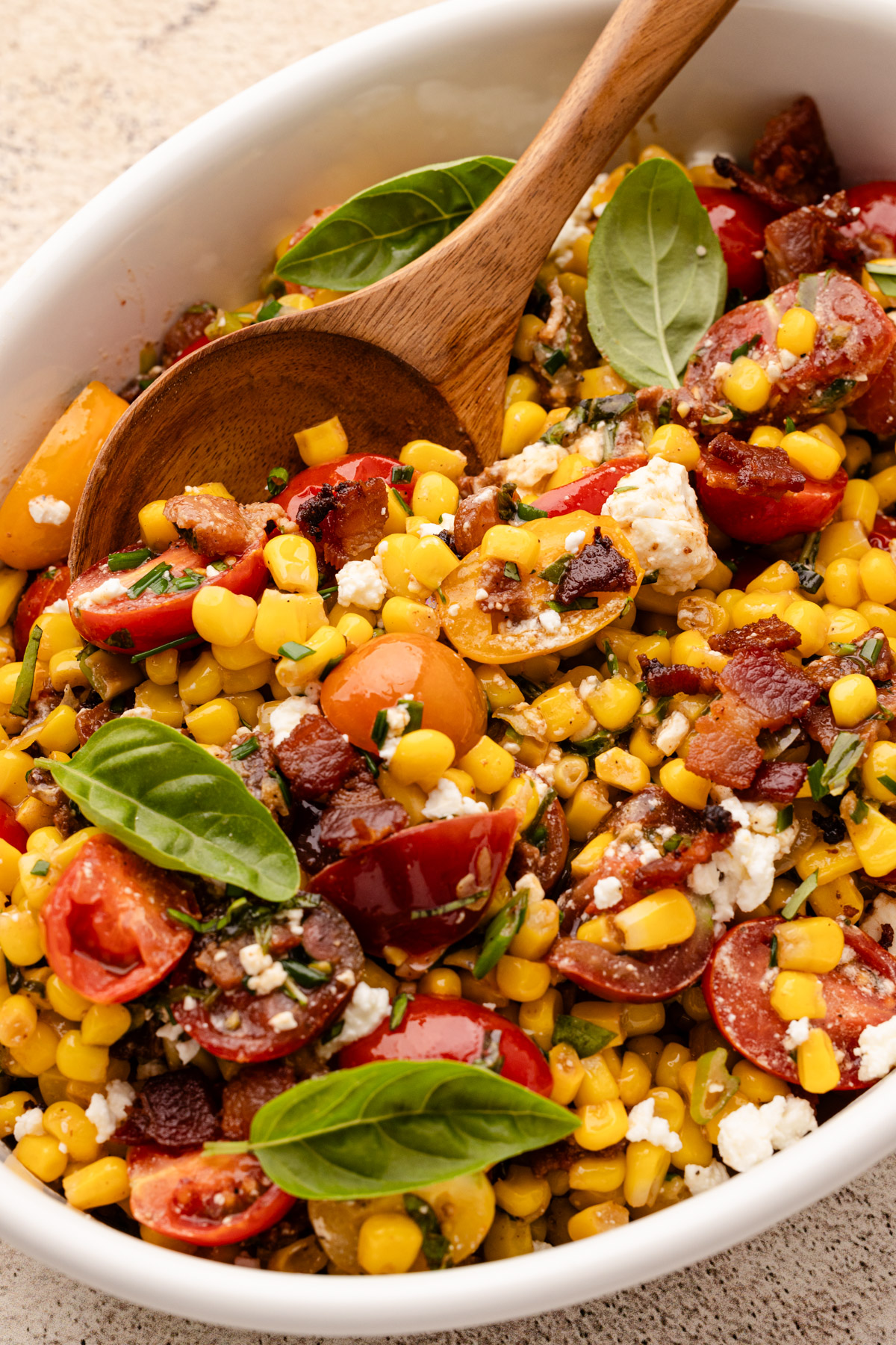 Corn succotash with tomatoes and bacon.