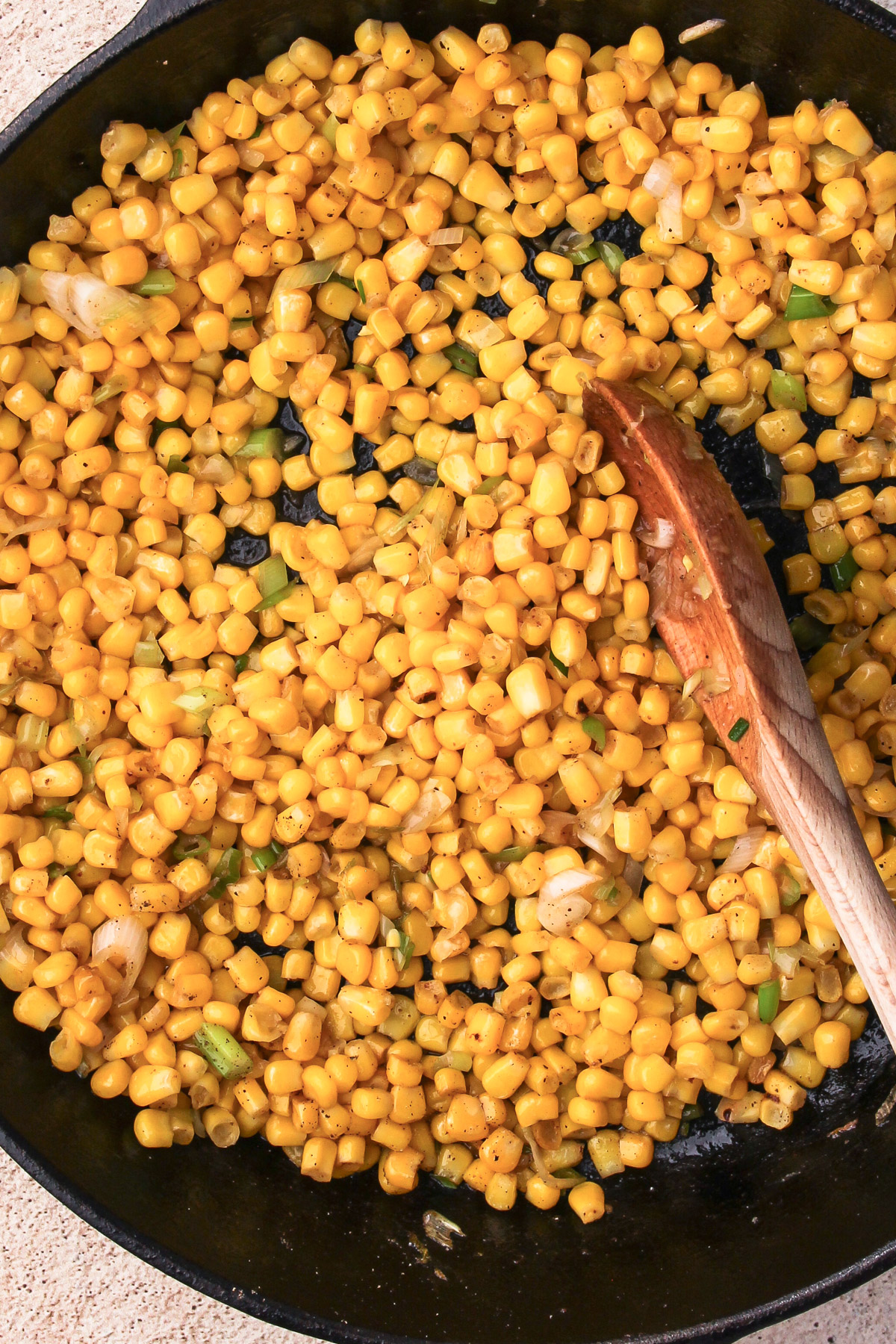 Corn in the pan for corn succotash.