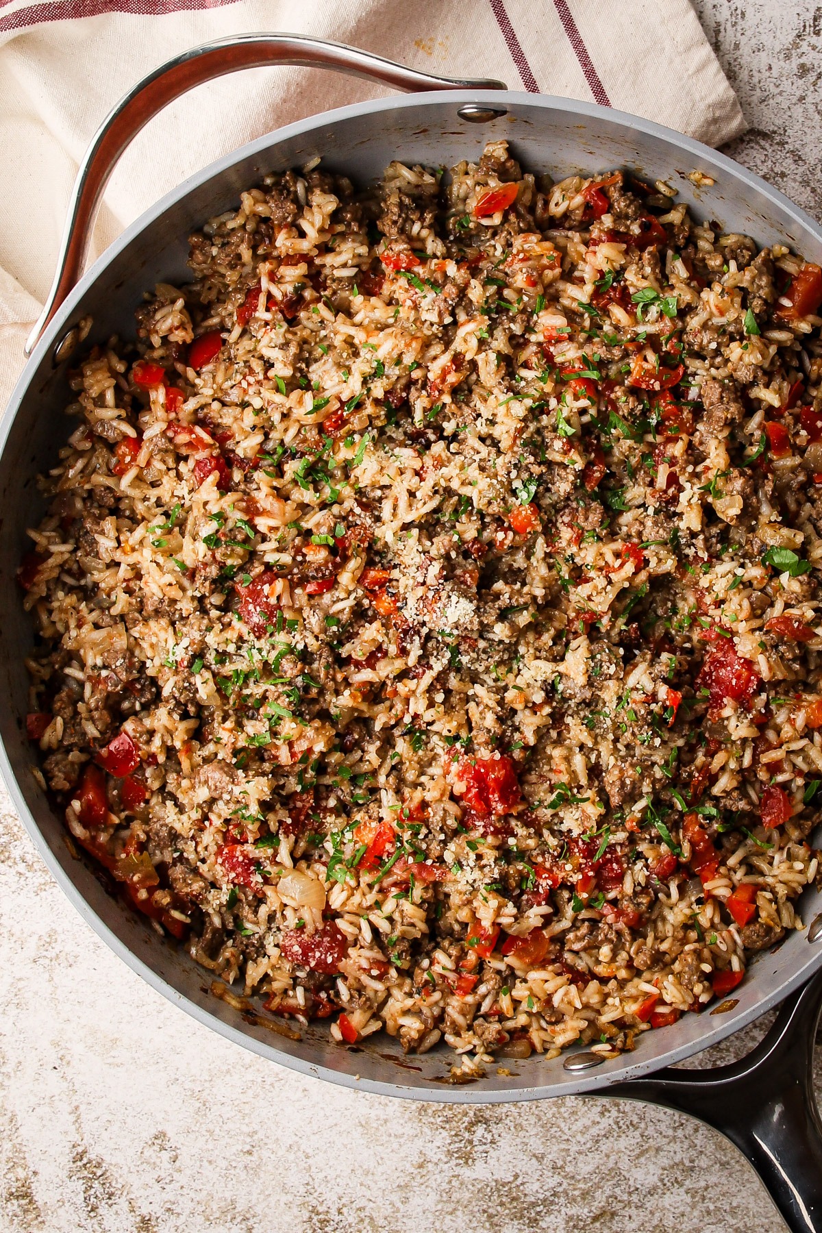 Italian beef and rice cooked in a pan.