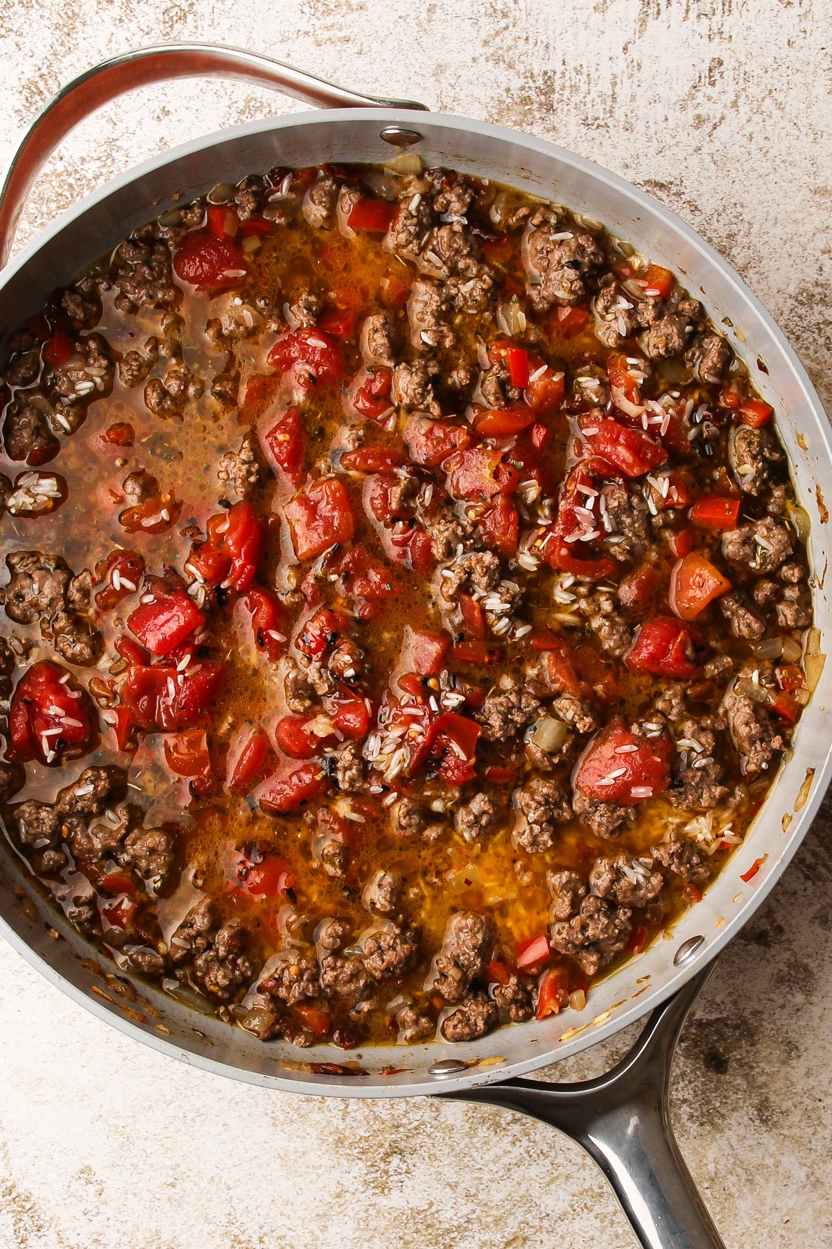 Italian beef and rice being prepared.