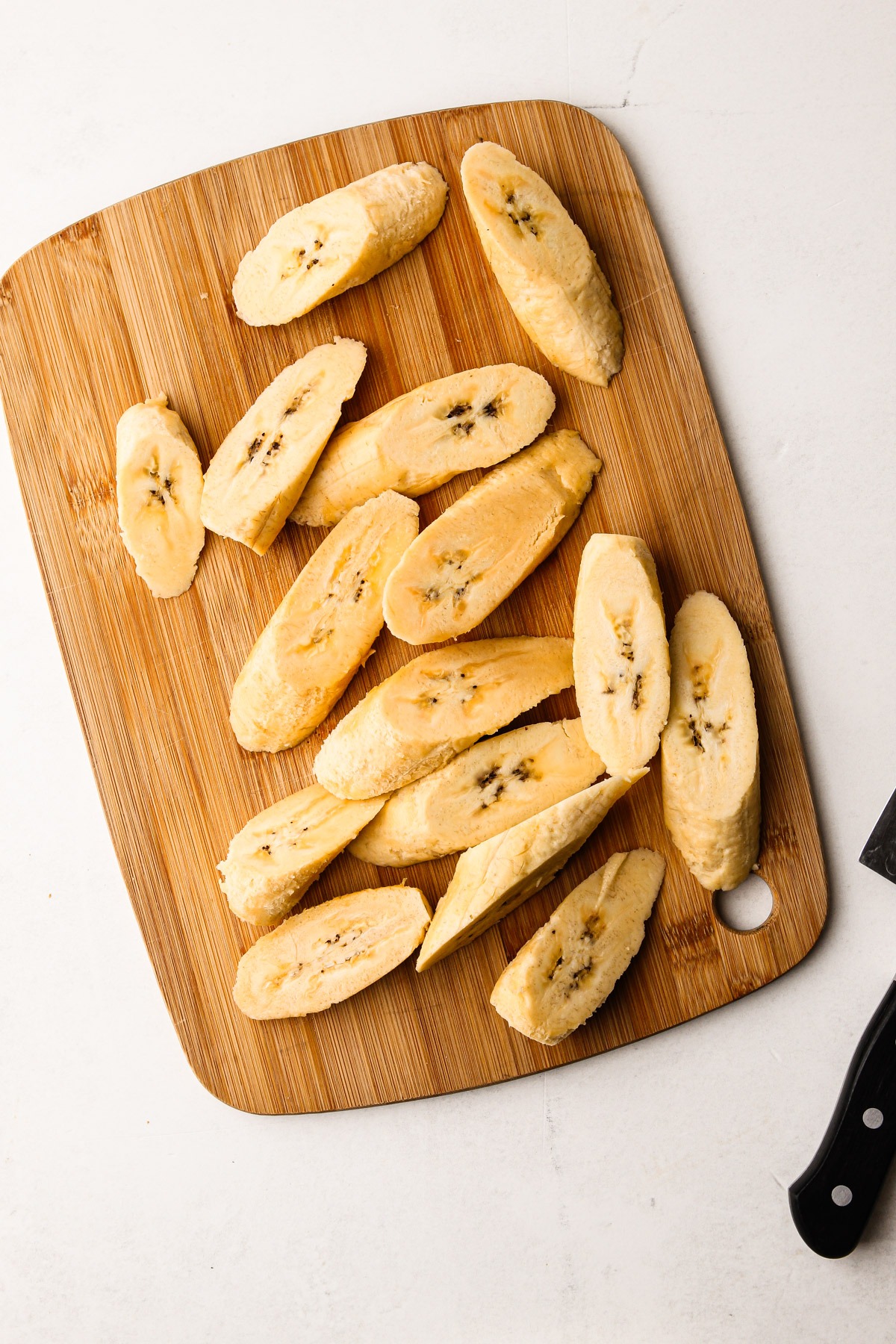 Cutting plantains.