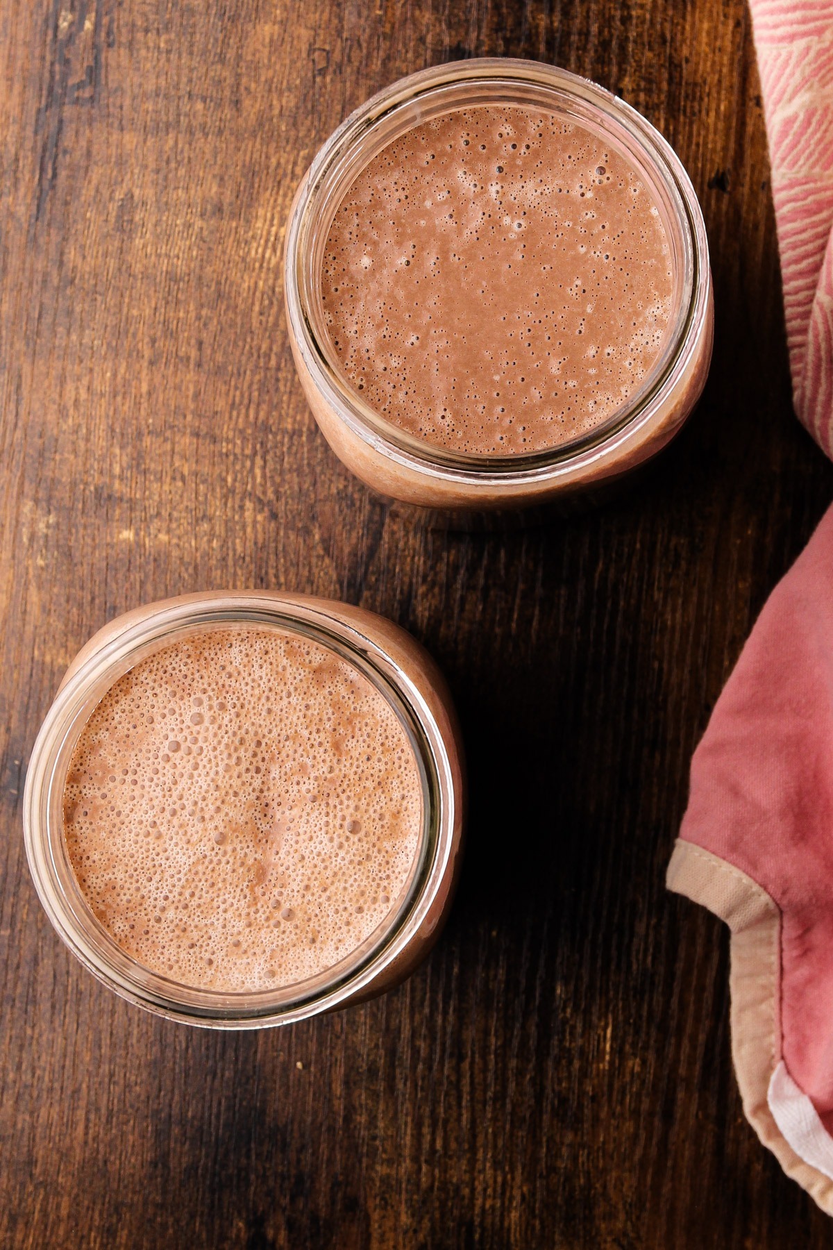 Homemade healthy chocolate milk in mason jars.