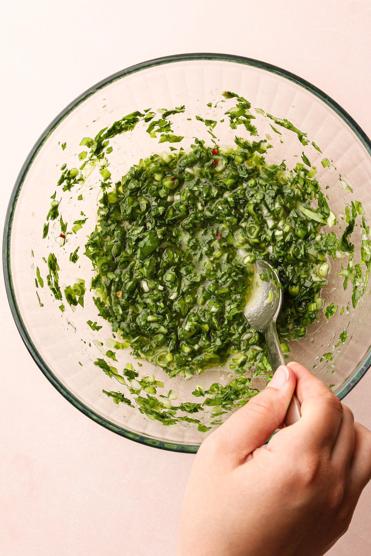 Mixing together the cilantro marinade.