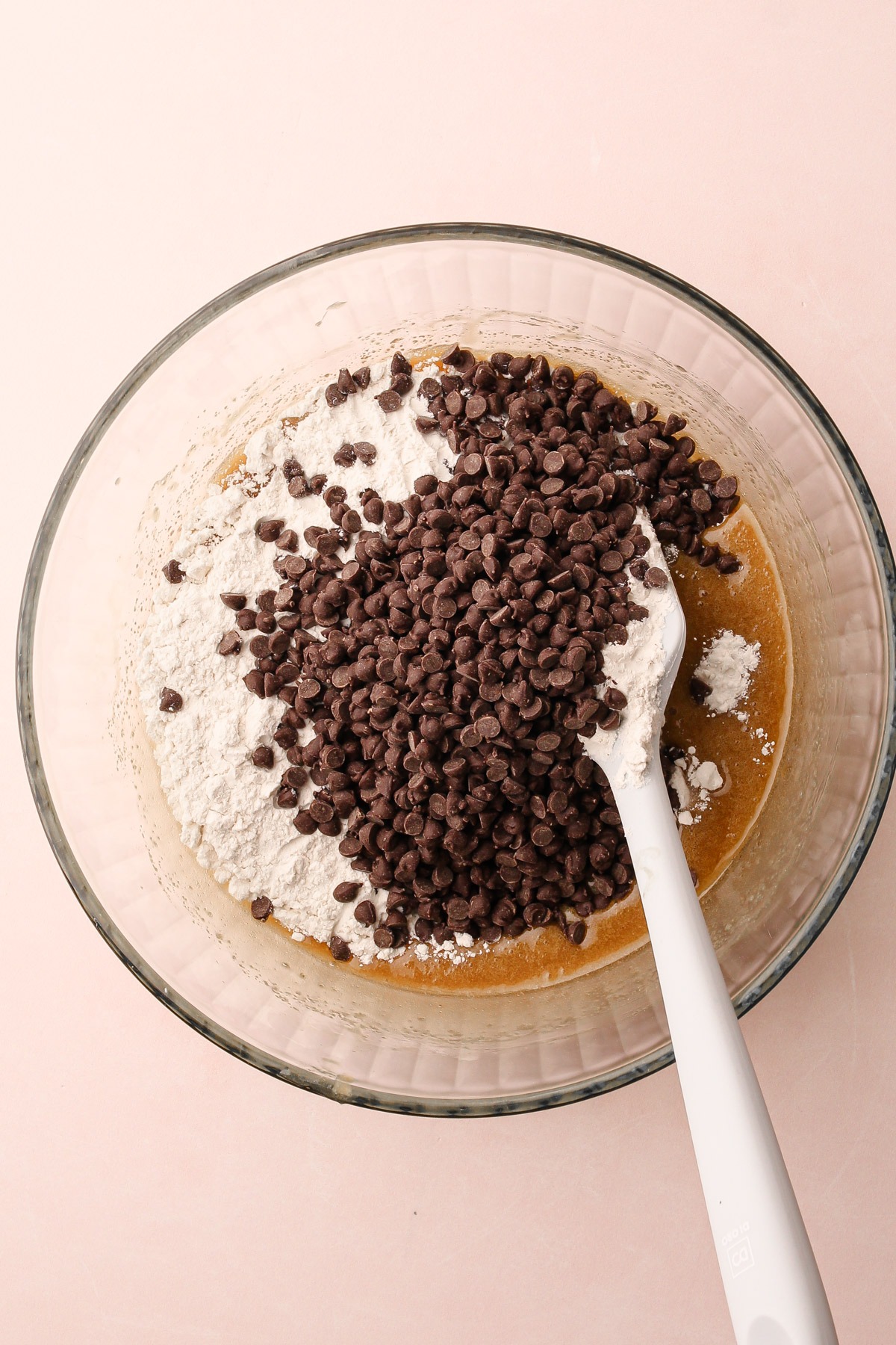 Mixing together the dough for easy chocolate chip cookies.