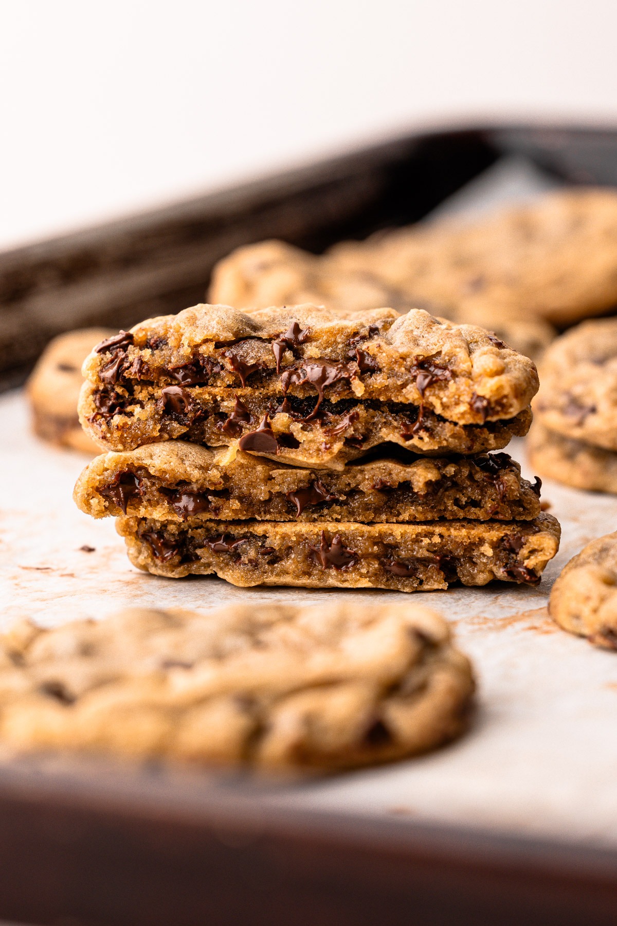 Two easy-to-make chocolate chip cookies split in half.