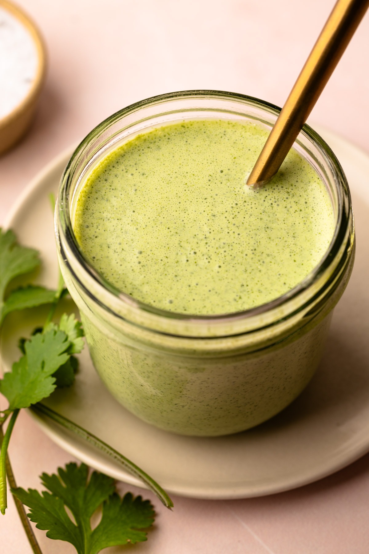 A jar of cilantro sauce.