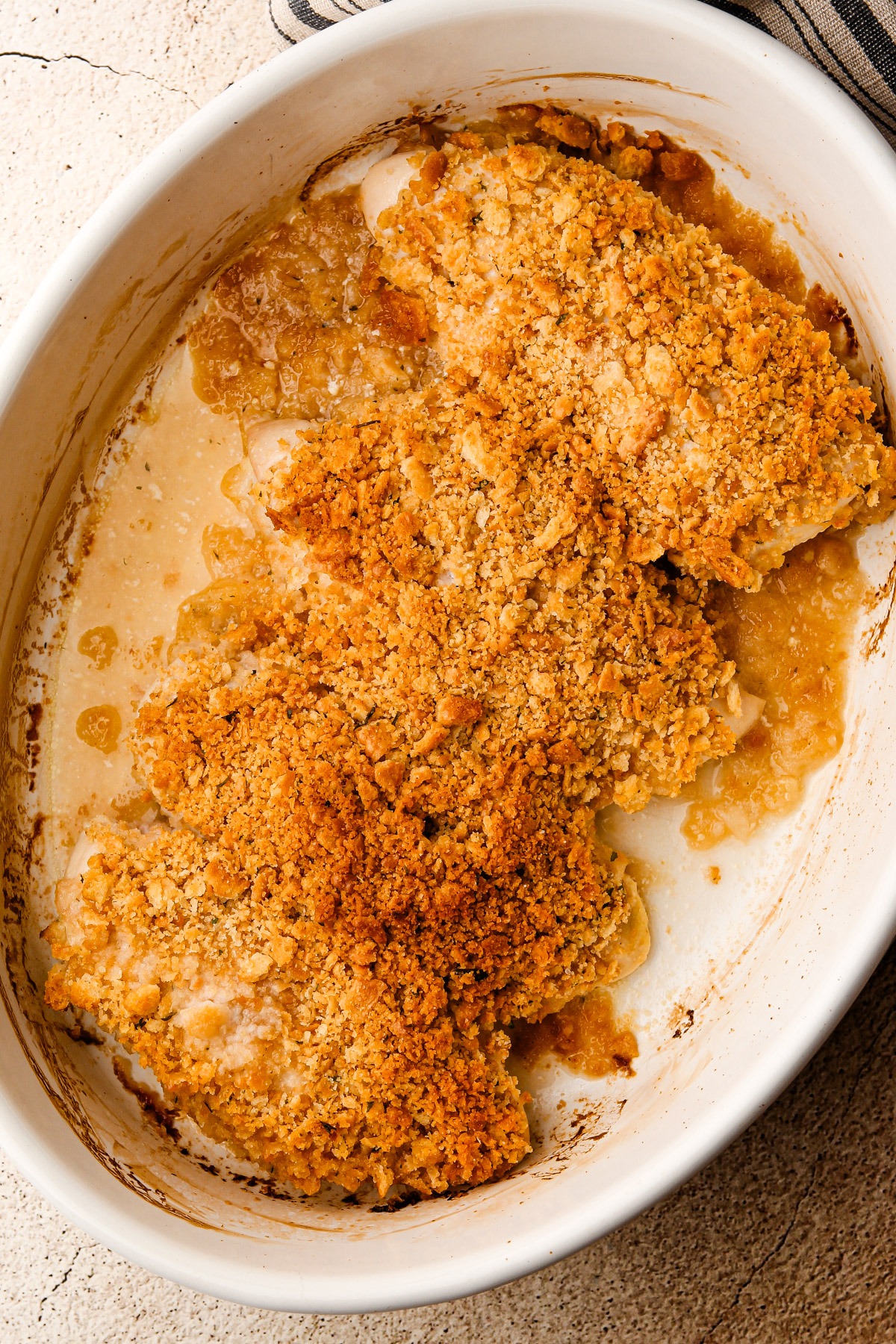 Fully baked chicken topped with ritz cracker crumbs.