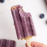 A breakfast popsicle made from fruit, yogurt and granola.