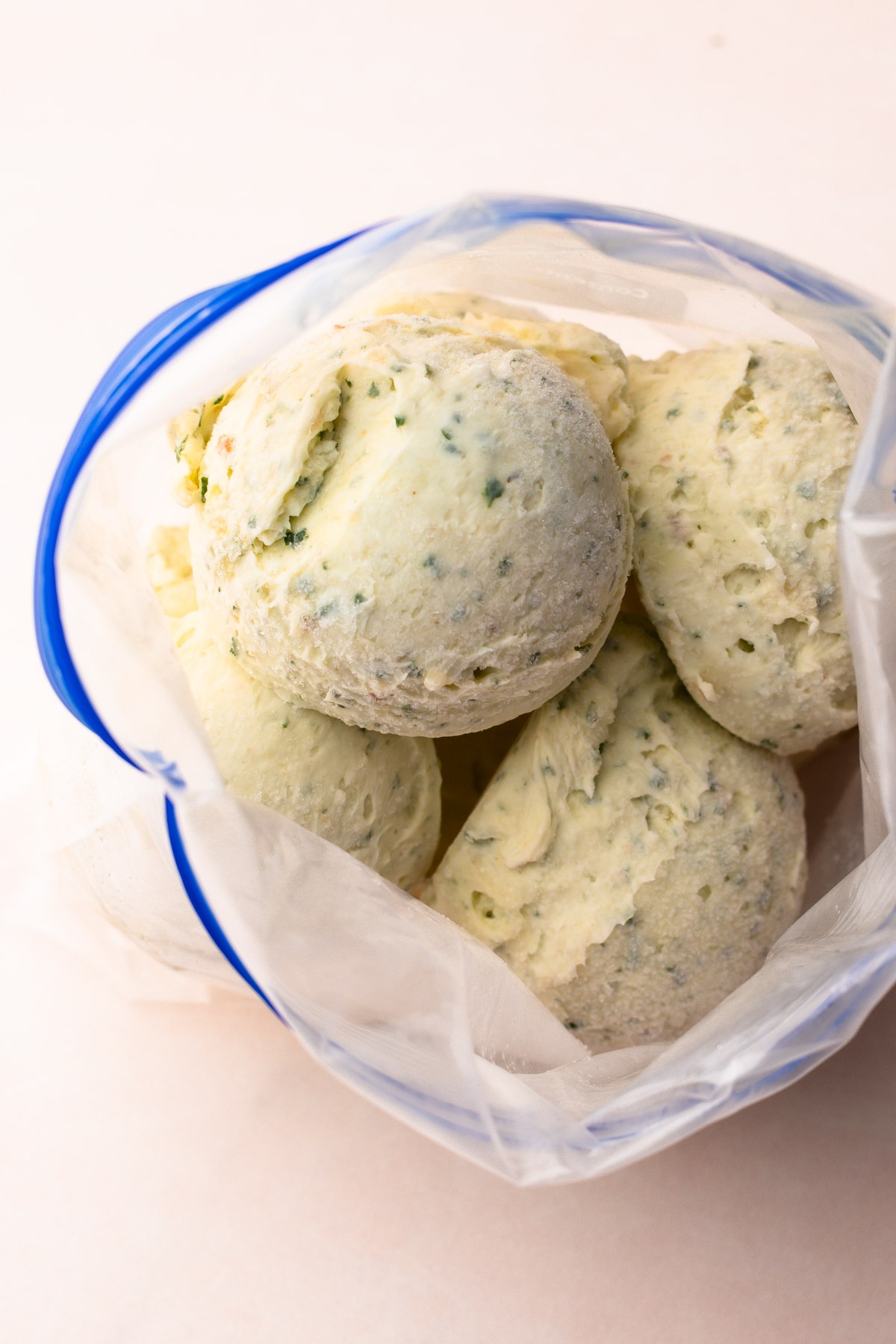 Homemade garlic butter made-ahead and scooped into balls, frozen and stored in a plastic bag.