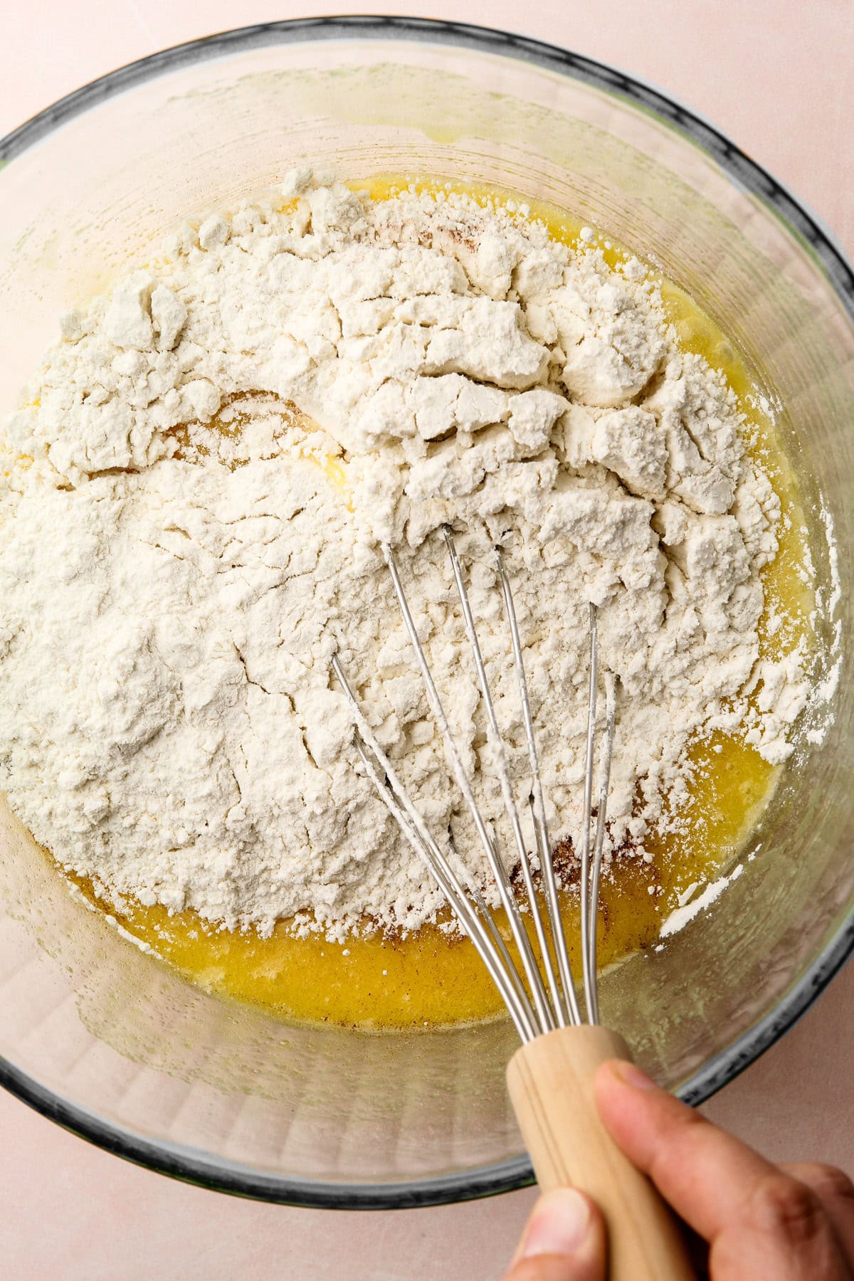 Dry ingredients added to the wet mixture for one bowl snickerdoodles.