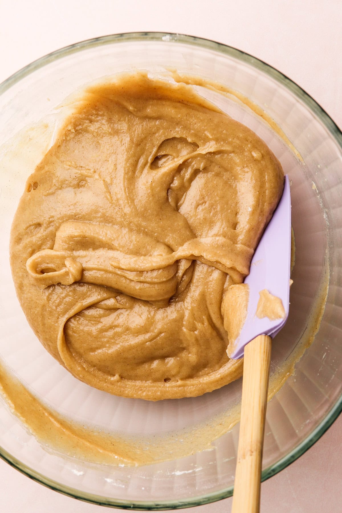 Smooth, golden batter for snickerdoodle cookies in a mixing bowl.