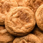 A batch of freshly baked snickerdoodles made from an easy and simple recipe.