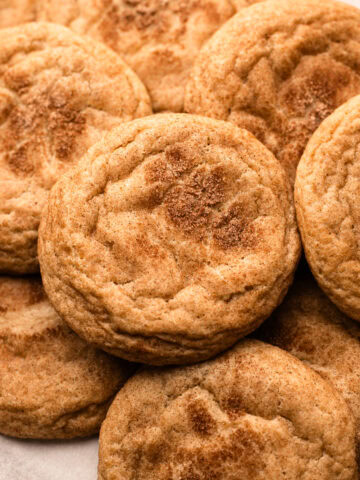 A batch of freshly baked snickerdoodles made from an easy and simple recipe.