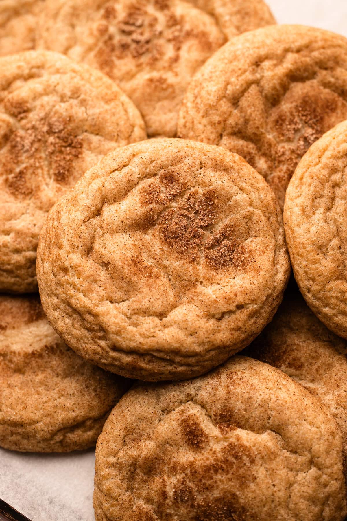 A batch of freshly baked snickerdoodles made from an easy and simple recipe.