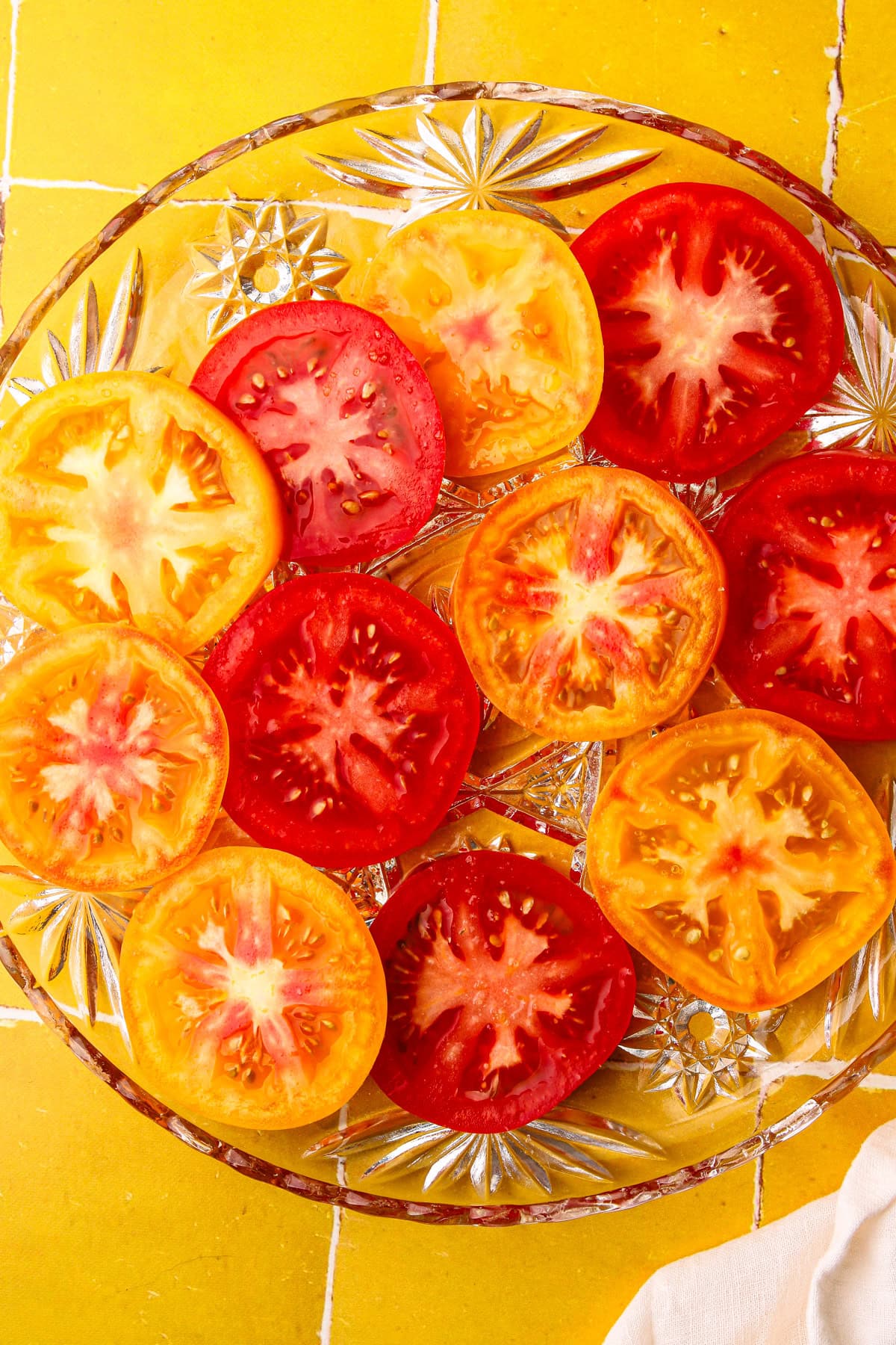 Sliced tomatoes on a plate.