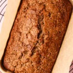 A fully baked loaf of zucchini bread.