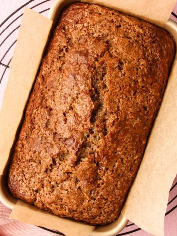 A fully baked loaf of zucchini bread.