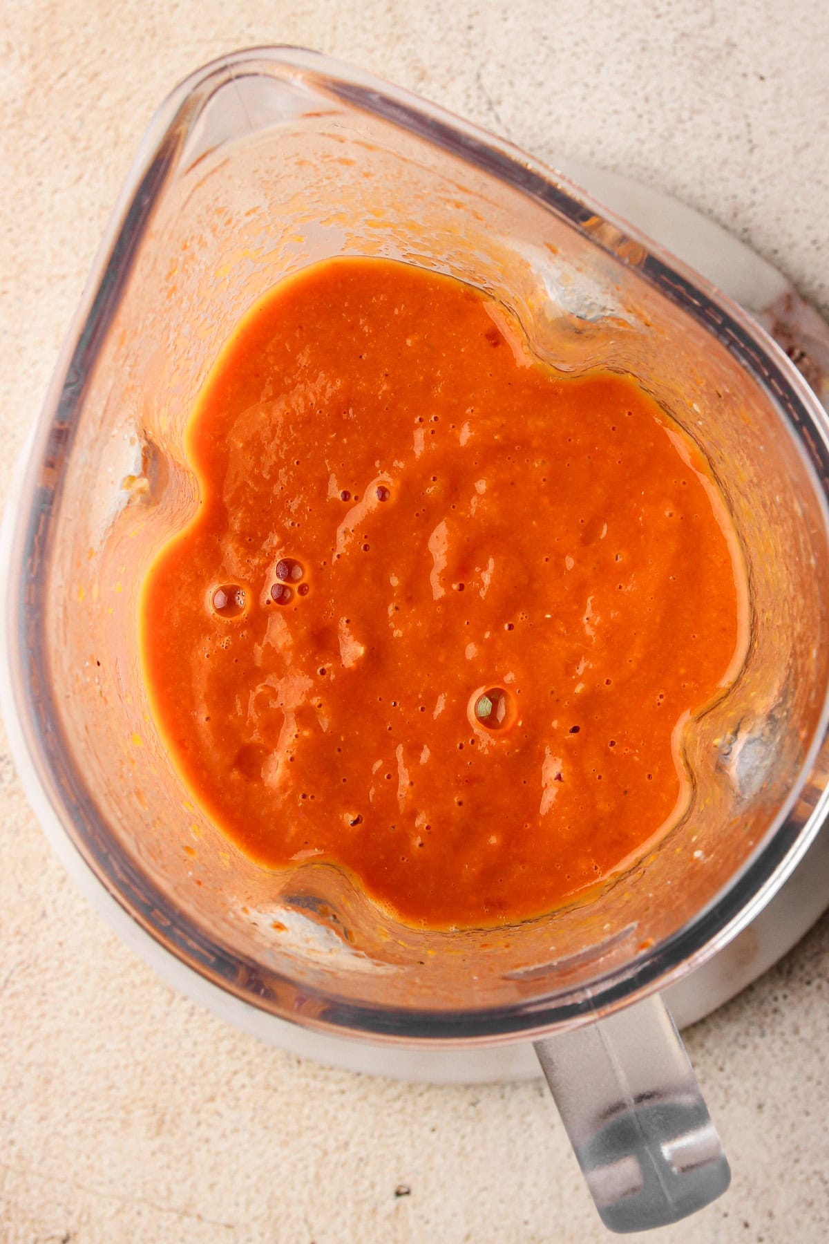 Roasted tomatoes and garlic in a blender before pureeing.